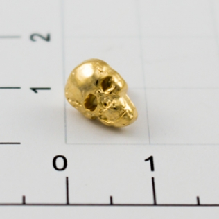 Заклепки череп 7 мм золото